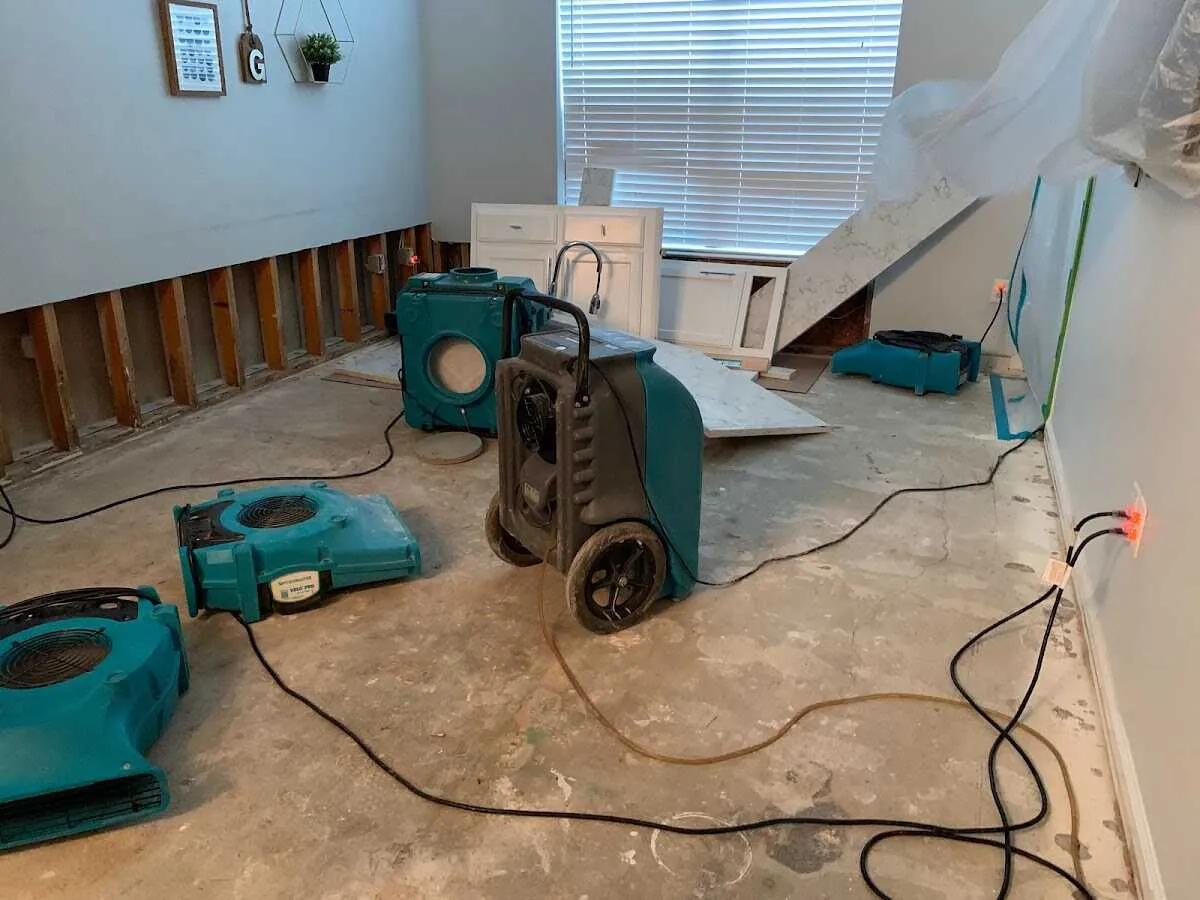Dehumidifier in flood-cut room for Water Damage Restoration in Forestville